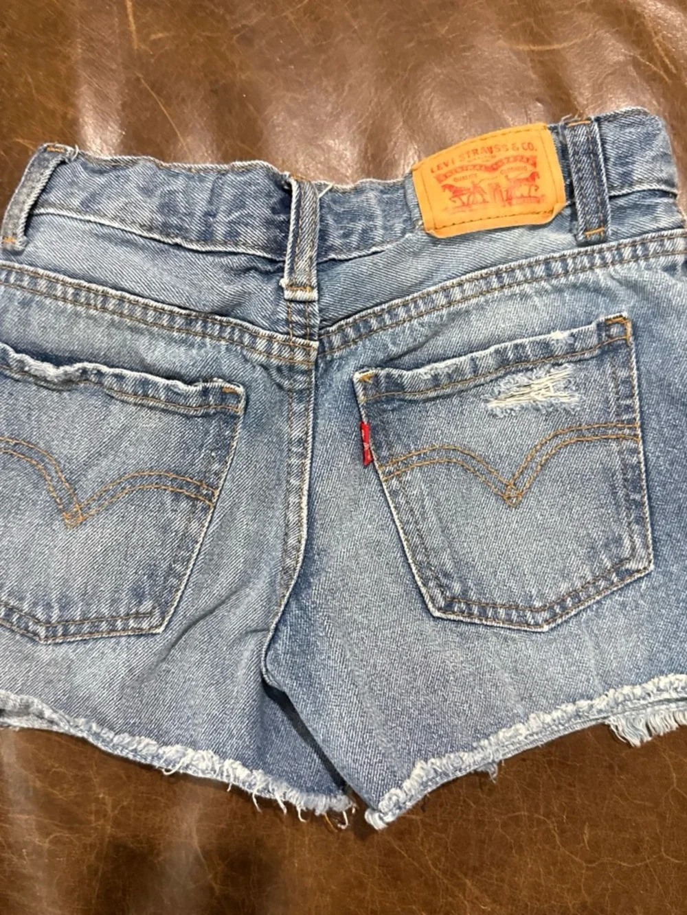 Levi's Light Blue Distressed Denim Shorts